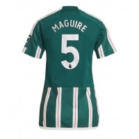 Camisa de Futebol Manchester United Harry Maguire #5 Equipamento Secundário Mulheres 2023-24 Manga Curta